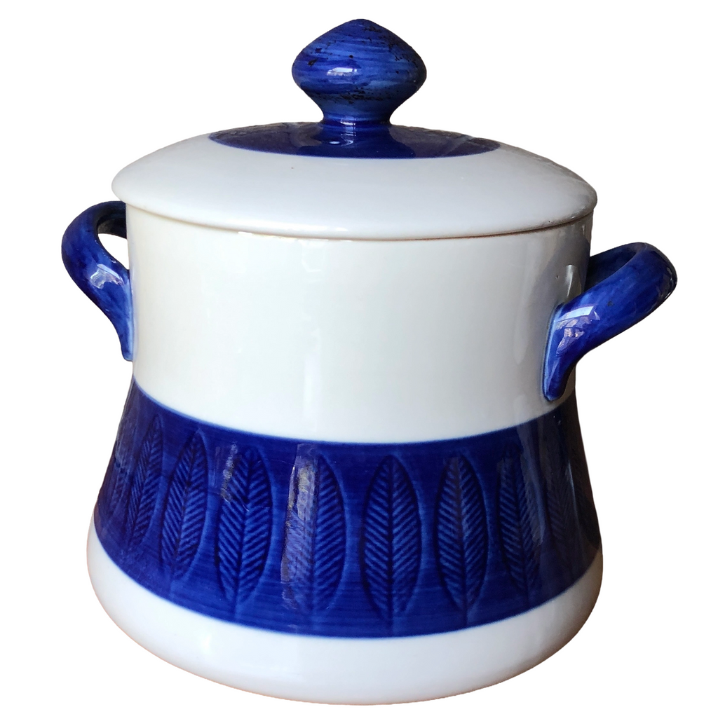A vintage Rorstrand Koka Blue large casserole dish with a lid, featuring a deep blue glaze and geometric leaf patterns.
