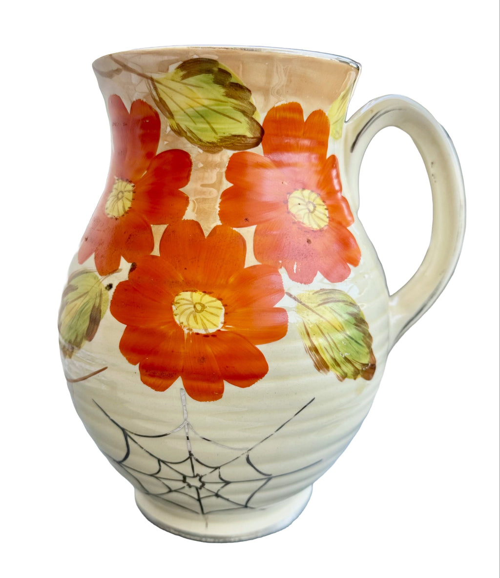 Arthur Wood Art Deco jug vase with orange nasturtium flowers and green leaves on cream ribbed earthenware body, c.1930s