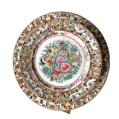 Japanese porcelain decorated with auspicious symbols including butterflies , roses and peaches in Hong Kong in the 20th century and are stamped YT.