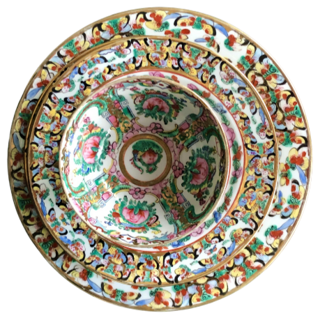 Japanese porcelain decorated with auspicious symbols including butterflies , roses and peaches in Hong Kong in the 20th century and are stamped YT.