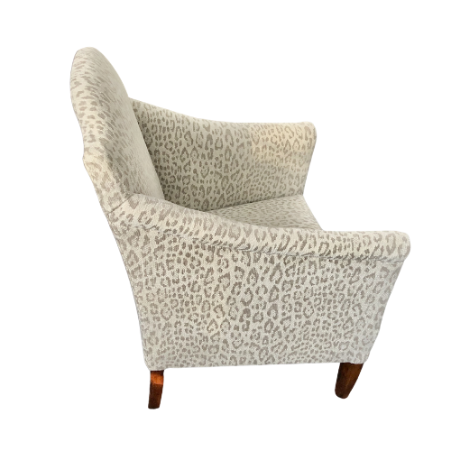 Elegant Edwardian armchair professionally refurbished and traditionally upholstered in a subtle animal print