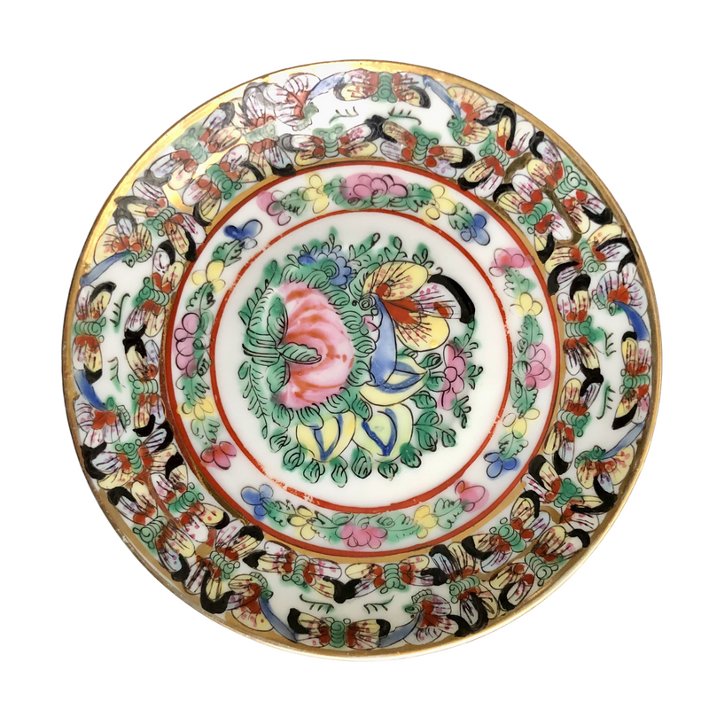 pair of fabulous vintage Famille Rose hand-decorated eggshell porcelain coffee cups and saucers. Japanese porcelain decorated in Hong Kong with auspicious symbols including butterflies, roses and peaches in the 20th century back stamp YT