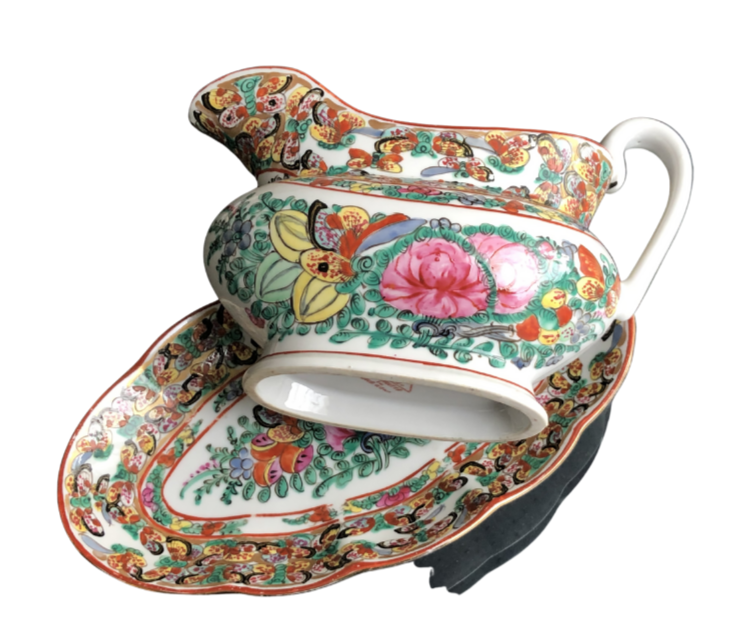 vintage Famille Rose hand-decorated porcelain sauce boat and stand. Japanese porcelain decorated in Hong Kong with auspicious symbols including butterflies, roses and peaches in the 20th century back stamp YT.
