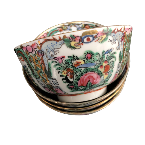 Japanese porcelain decorated with auspicious symbols including butterflies , roses and peaches in Hong Kong in the 20th century and are stamped YT.