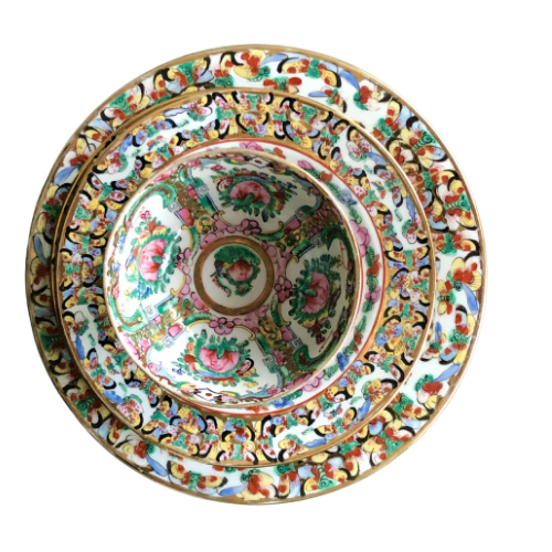 Japanese porcelain decorated with auspicious symbols including butterflies , roses and peaches in Hong Kong in the 20th century and are stamped YT.