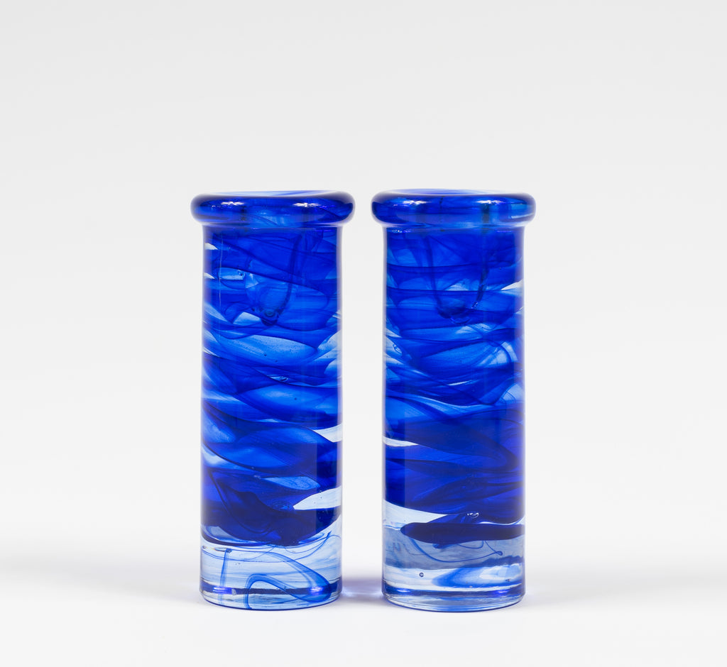 A set of Kosta Boda Blue Swirl Candle Holders
