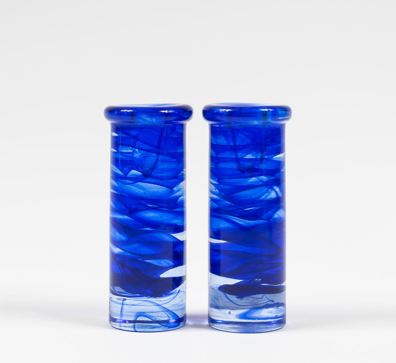 A set of Kosta Boda Blue Swirl Candle Holders
