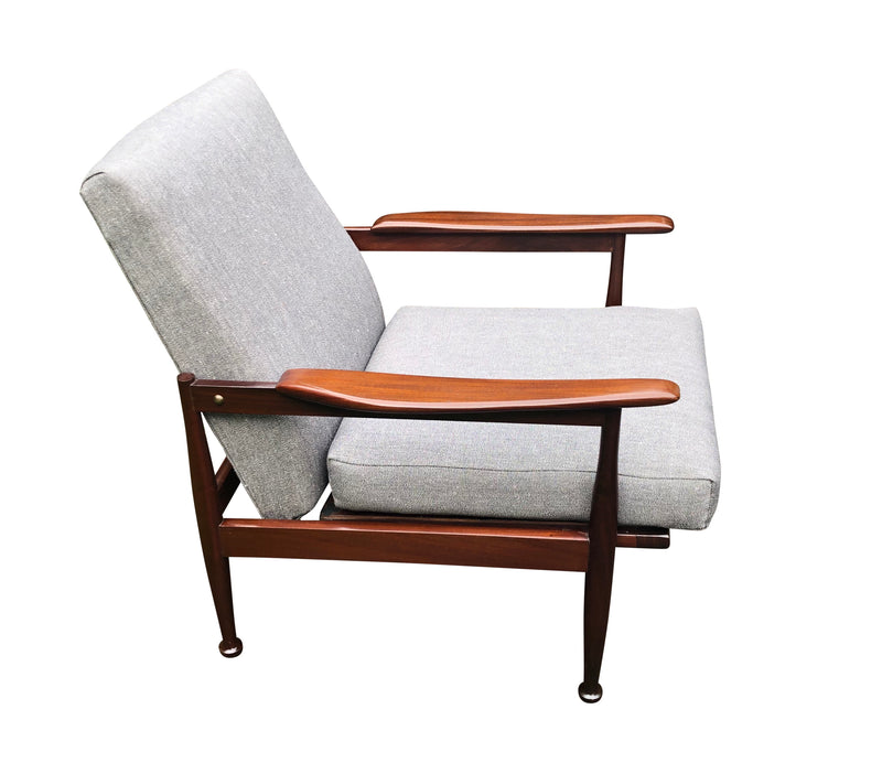 Pair of Mid Century “Manhattan” armchairs by Guy Rogers,designed by Eric Pamphilon
