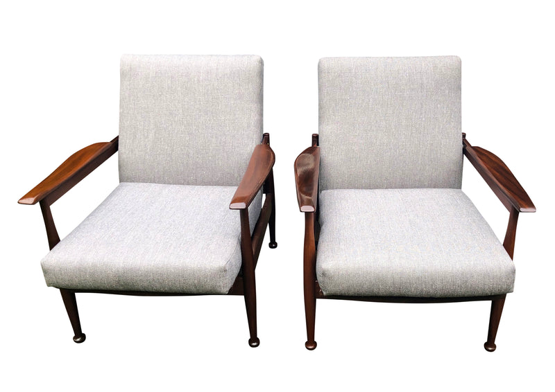 Pair of Mid Century “Manhattan” armchairs by Guy Rogers,designed by Eric Pamphilon