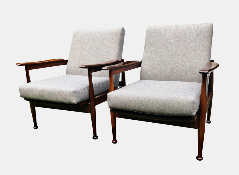 Pair of Mid Century “Manhattan” armchairs by Guy Rogers,designed by Eric Pamphilon