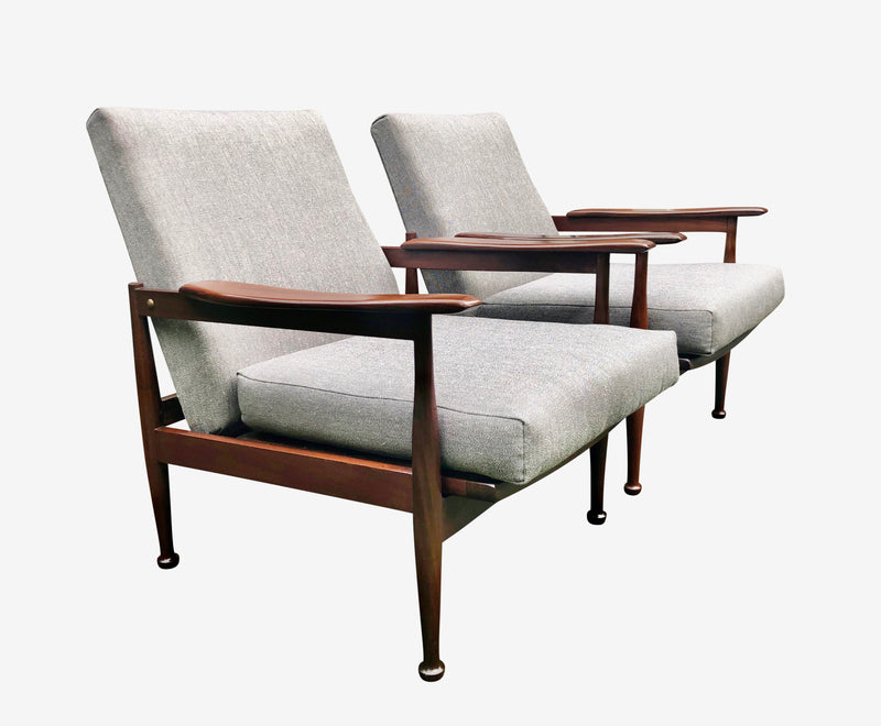 Pair of Mid Century “Manhattan” armchairs by Guy Rogers,designed by Eric Pamphilon