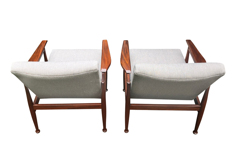 Pair of Mid Century “Manhattan” armchairs by Guy Rogers,designed by Eric Pamphilon