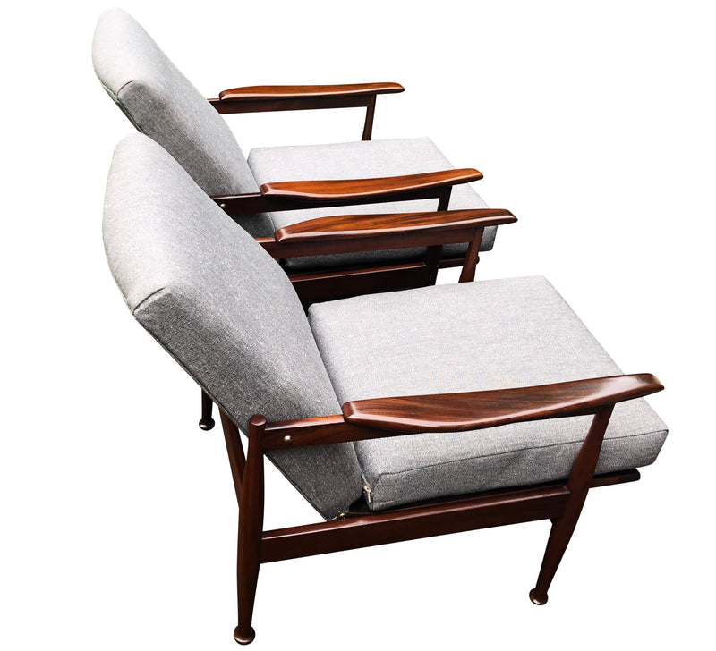 Pair of Mid Century “Manhattan” armchairs by Guy Rogers,designed by Eric Pamphilon