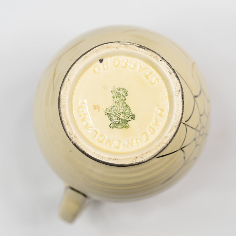 base/underside with maker's mark Base of Arthur Wood Art Deco jug vase showing green Quality Arthur Wood England maker's mark and Pattern 3123 number, c.1934
