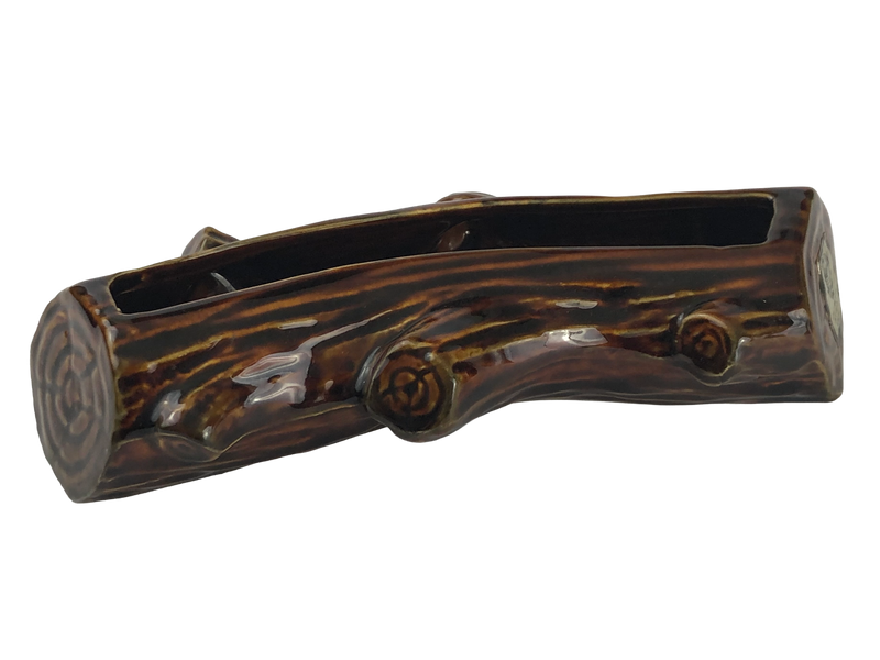 Side view of Dartmouth Pottery brown glazed log planter showing moulded bark, knots and cut-log end.