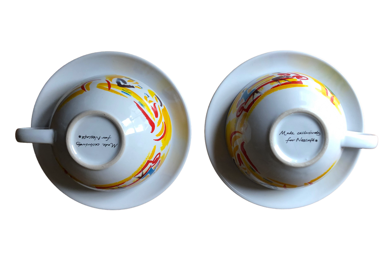 Photo of the cups upside down showing their bases: Bases of the vintage Nescafé promotional cups, shown upside down and marked Made Exclusively for Nescafé
