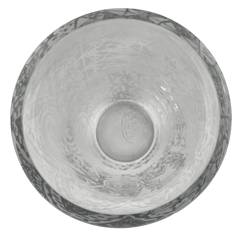 Top view of the crystal vase showing its circular opening, thick rim and abstract etched decoration.