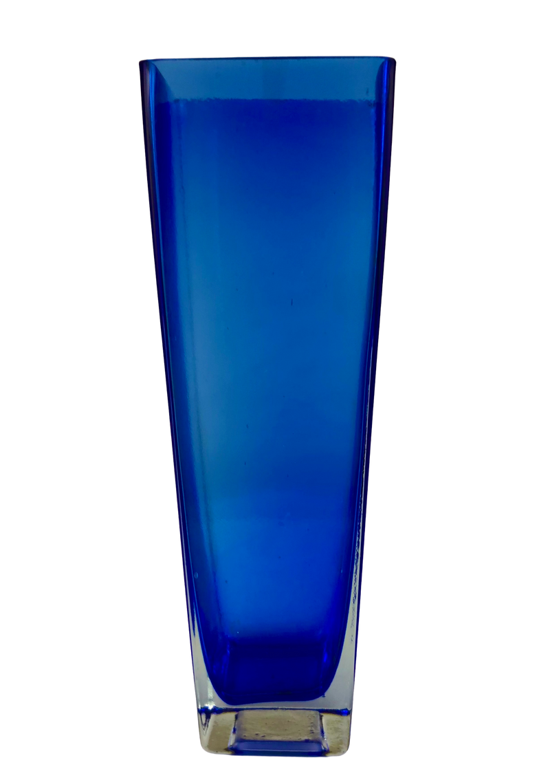 Front view of a vintage cobalt blue glass vase with tapered sides and a substantial clear glass base.