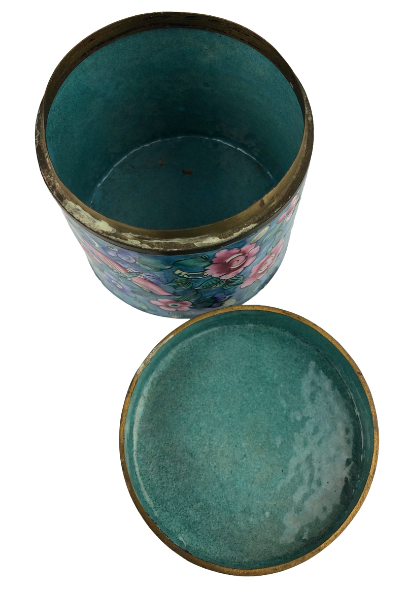 Open Canton enamel jar and upturned lid showing their turquoise enamel interiors and age-related wear around the metal rims.