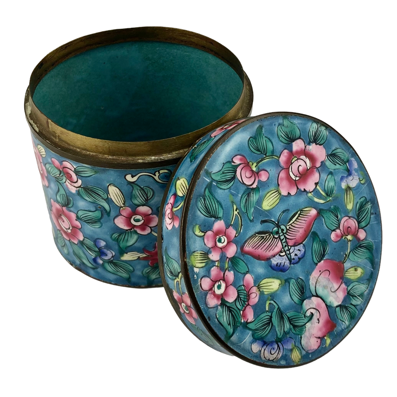 Canton enamel jar with lid resting alongside, showing the turquoise enamel interior, exposed copper rim and floral decoration.