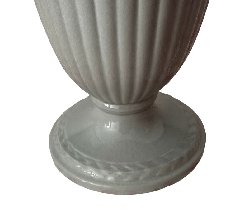 Close-up of fluted body and circular footed base of 1955 Wedgwood Embossed Queen's Ware vase in Windsor Grey