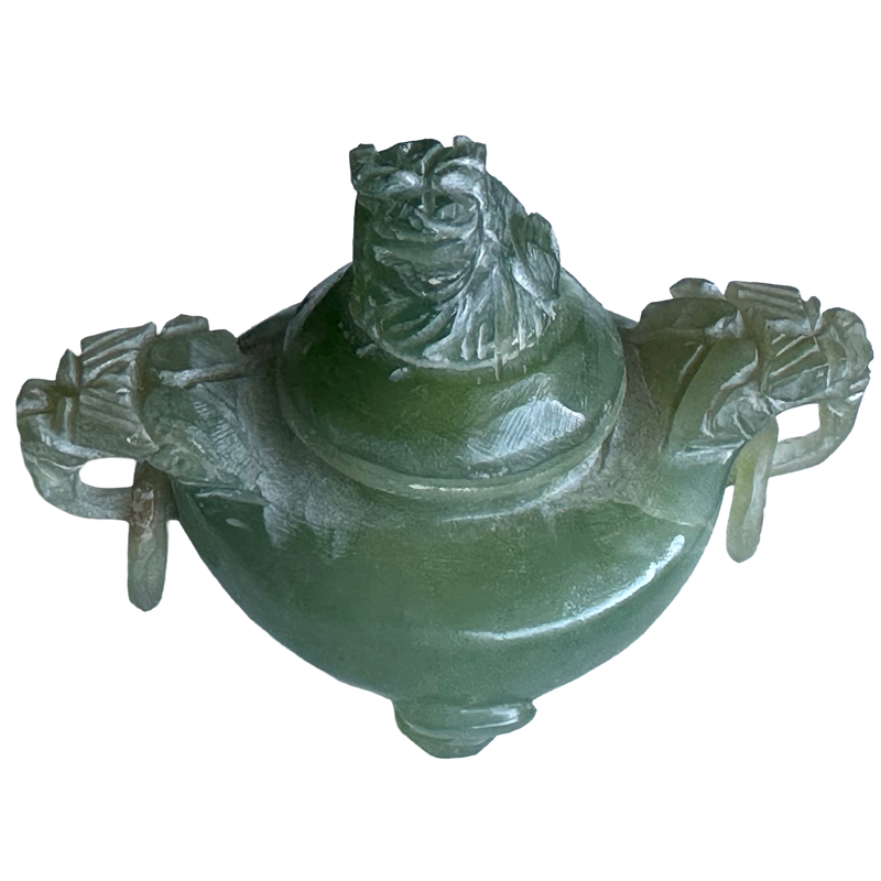 Elevated front view of Chinese jadeite censer, showing the carved beast finial, fitted cover and paired ring handles.