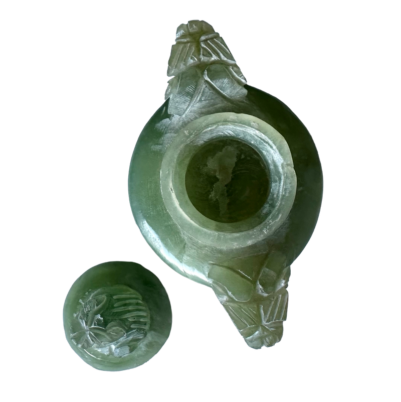 Top view of Chinese green jadeite censer with cover removed and placed alongside, showing the hollow interior and circular rim.