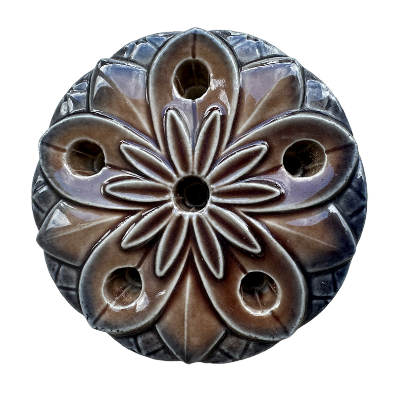 Wade Water Lily ceramic candle holder viewed from above, showing the moulded floral design and six candle socket