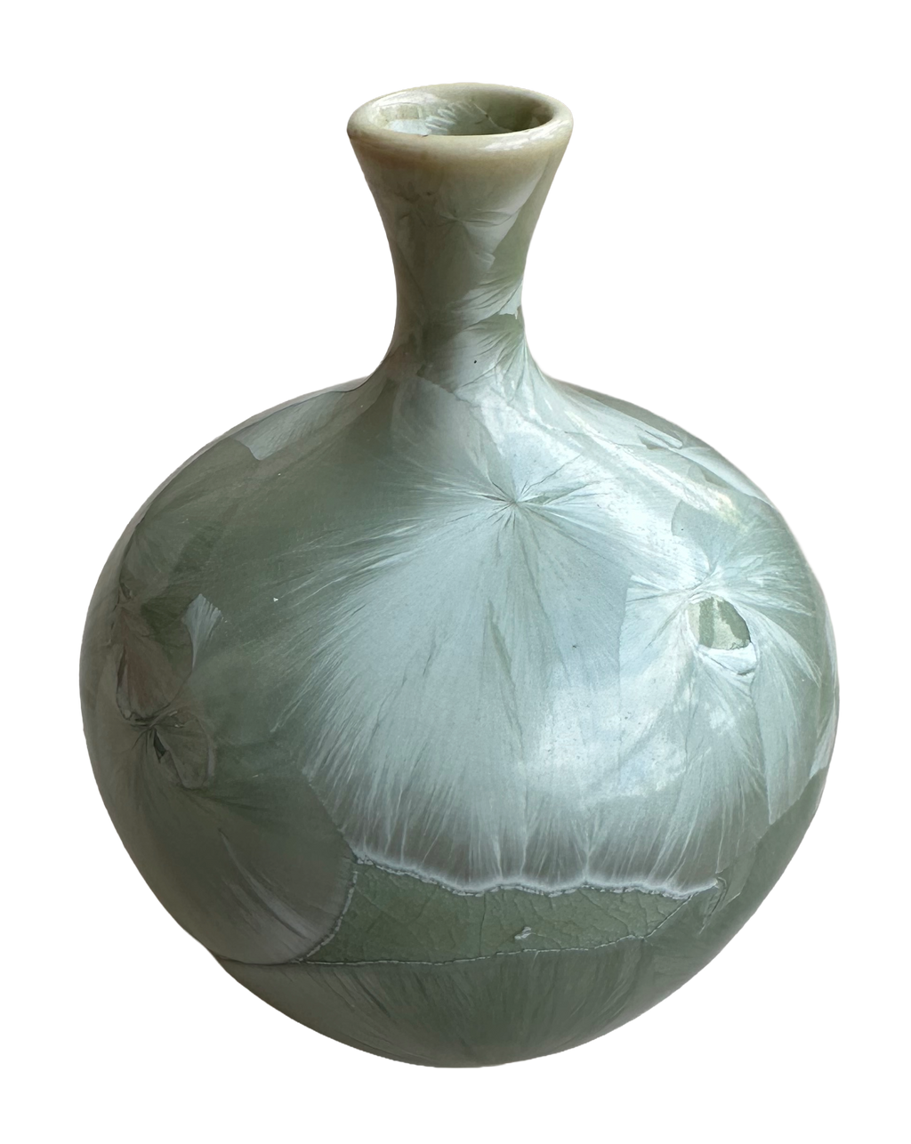 Louise Reding miniature porcelain bud vase with a rounded body, narrow neck and pale sage-green crystalline glaze.