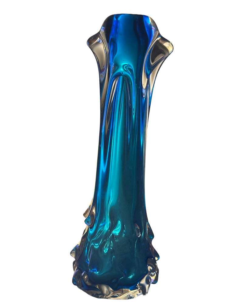 Škrdlovice turquoise glass vase showing broad clear shoulder lobes and a sculptural flared base.