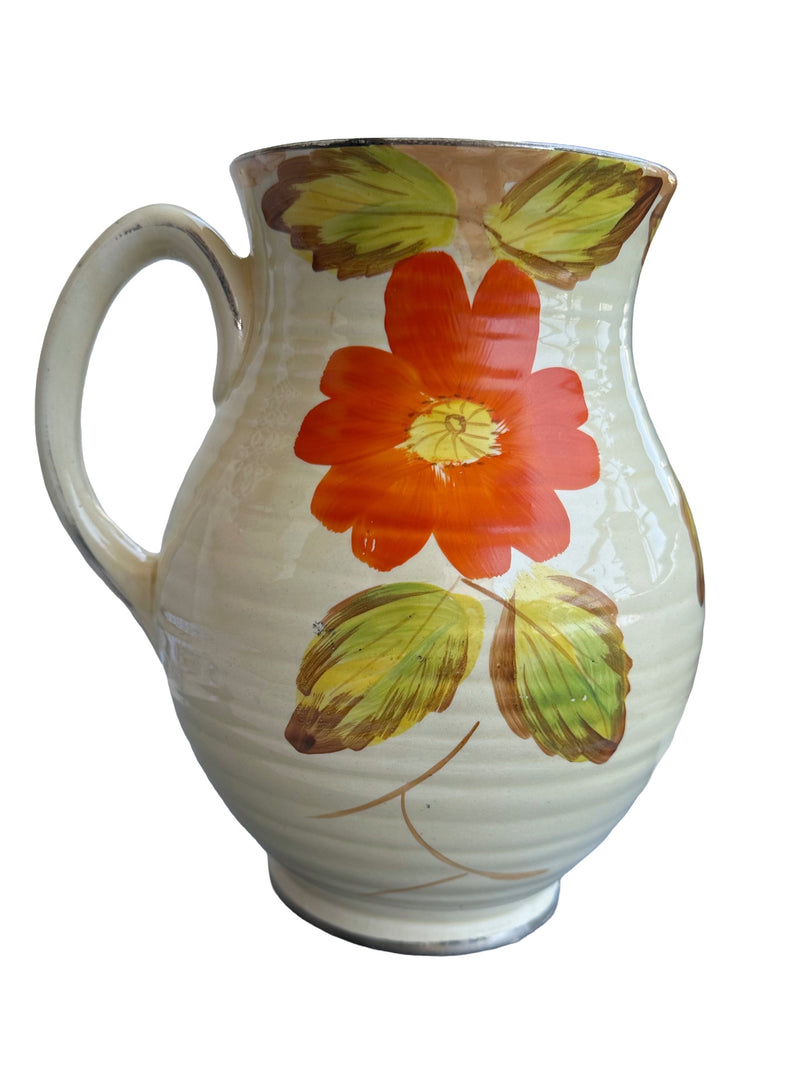 Three-quarter front with handle, single nasturtium bloom Arthur Wood 1930s Art Deco earthenware
