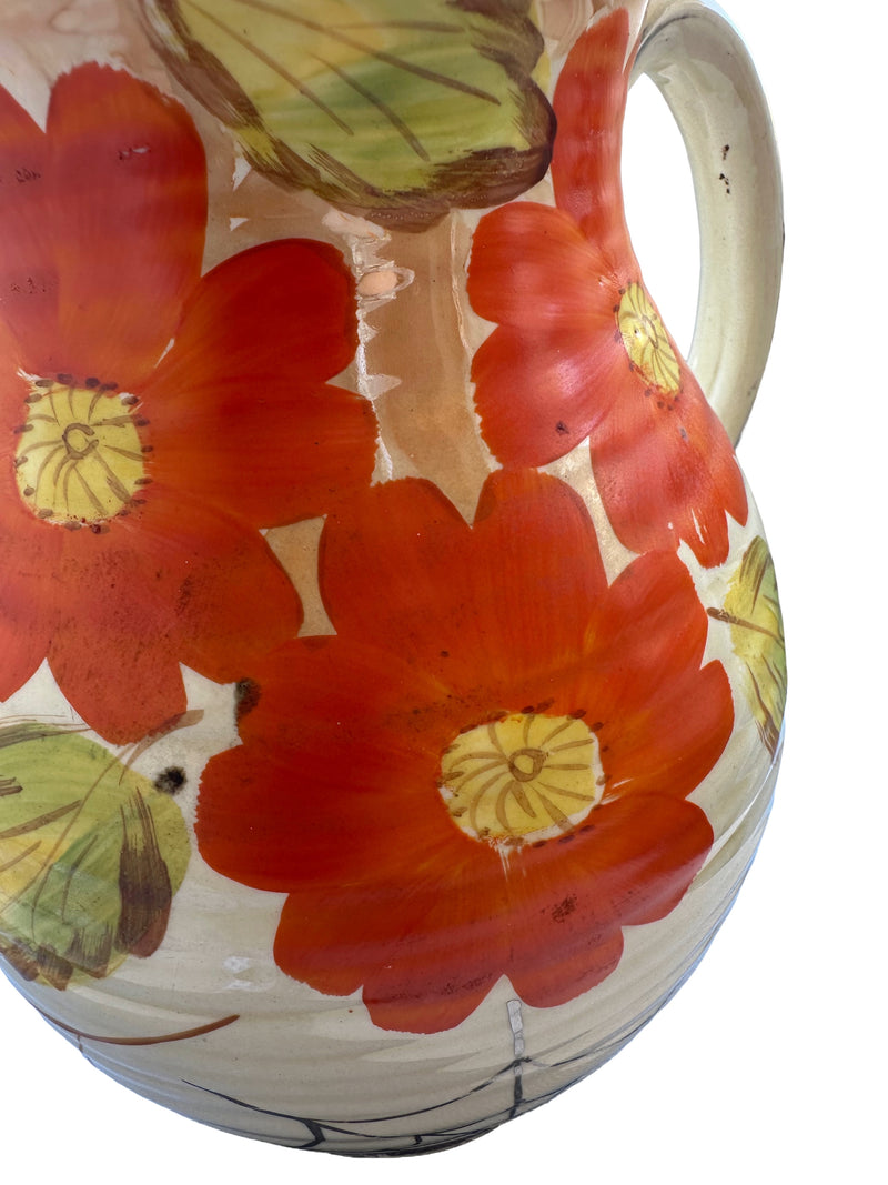 close-up of nasturtium flowers and handle Close-up of hand-painted orange nasturtium flowers with yellow centres and green leaves on Arthur Wood earthenware jug, 1930s
