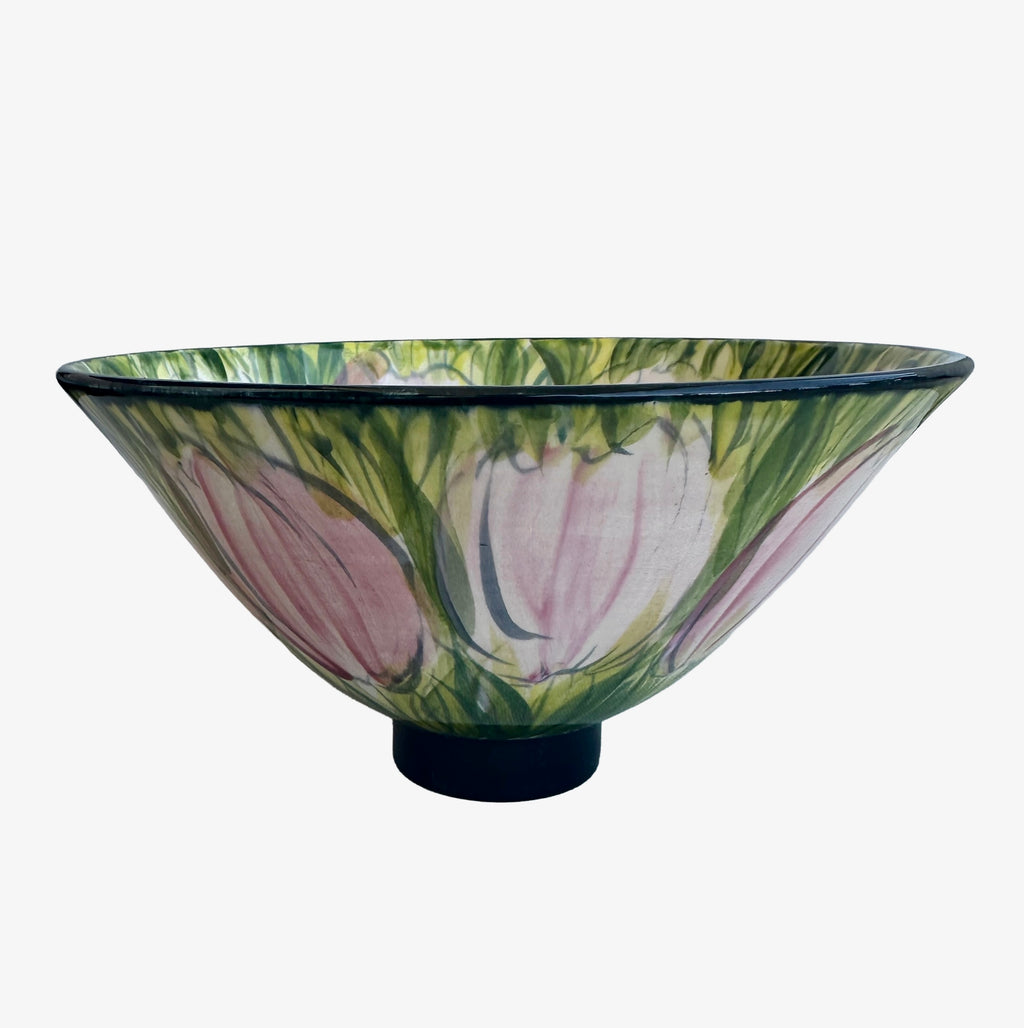 Ken and Valerie Shelton hand-painted studio pottery bowl with pink tulips and green leaves, side view, dark rim and foot