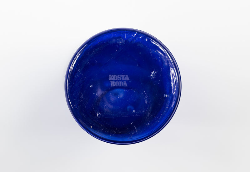 A set of Kosta Boda Blue Swirl Candle Holders